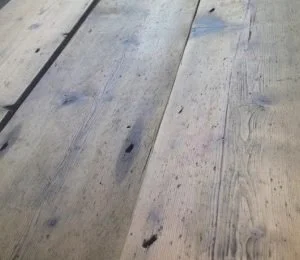 Reclaimed original pine floorboards